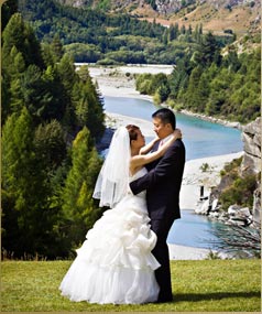 Bride and groom with the view behind